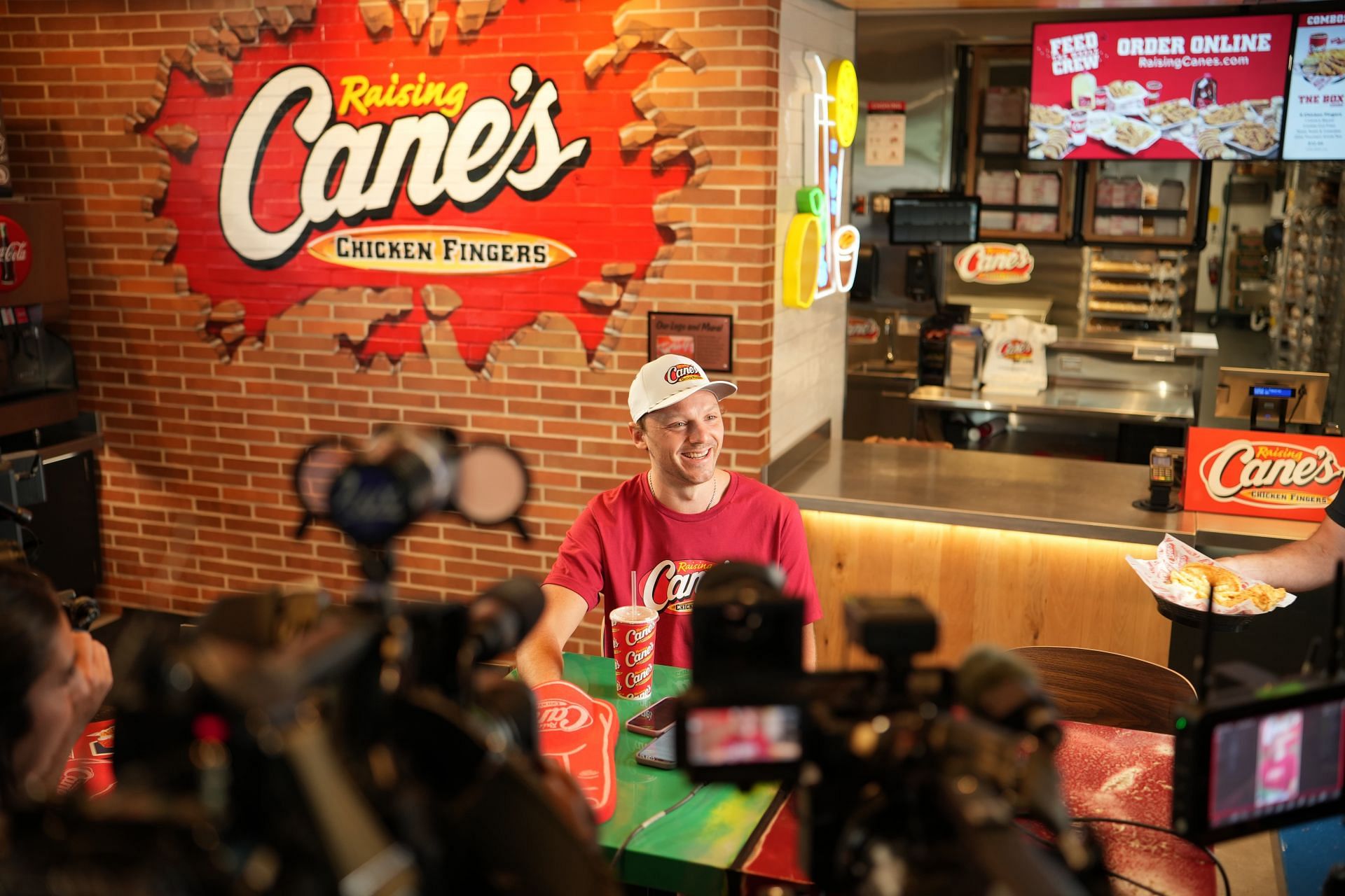 Sam Reinhart speaks with the media (Image via Raising Cane's PR)